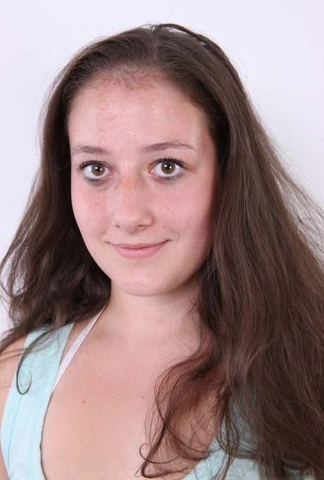 Plump girl Klara stands fully clothed before making her totally nude debut