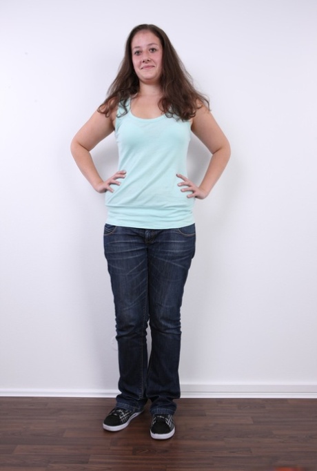 Plump girl Klara stands fully clothed before making her totally nude debut