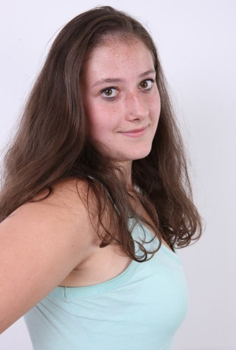 Plump girl Klara stands fully clothed before making her totally nude debut
