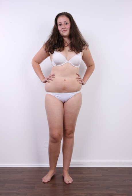 Plump girl Klara stands fully clothed before making her totally nude debut