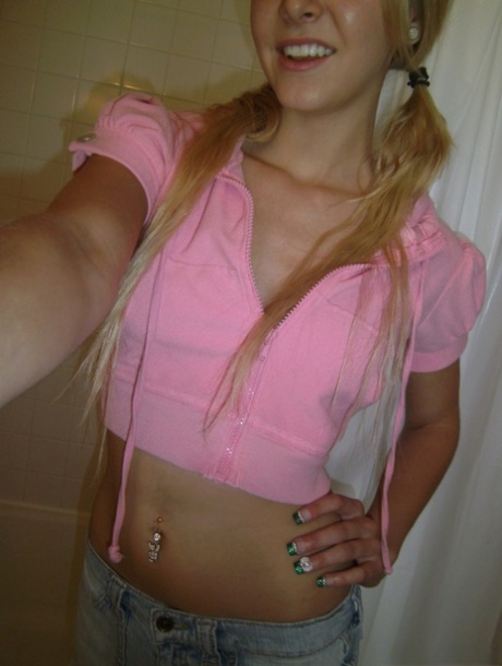 Petite blonde amateur Elle flaunts her small teen tits & flashes bald muff