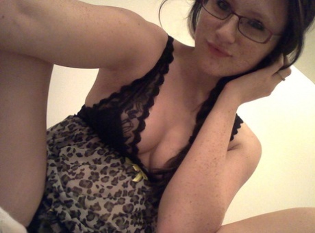 Geeky brunette Freckles 18 touches her hot tits in her solo homemade session