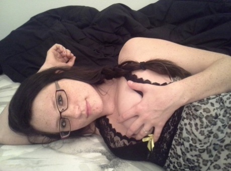 Geeky brunette Freckles 18 touches her hot tits in her solo homemade session