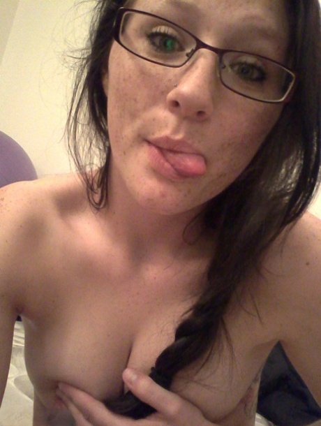 Geeky brunette Freckles 18 touches her hot tits in her solo homemade session