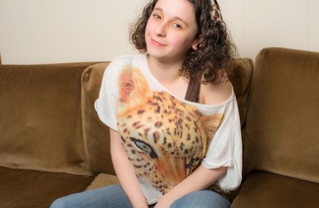 Young solo girl with fair skin unleashes her huge natural tits