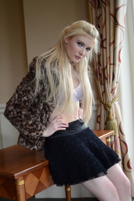 Blonde teen Locklear A shows her upskirt panties before undressing