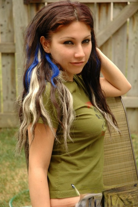 Sweet petite amateur Angel drops her pants outdoors to show her hot tiny ass