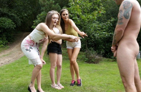 Three hotties please a horny voyeur by the side of a private lake
