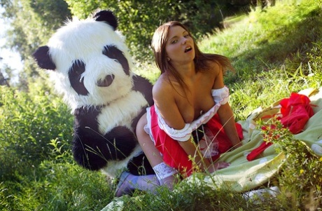 Teen girl Madelyn gets banged by a Panda in Little Red Riding Hood attire