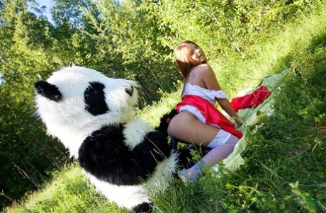 Teen girl Madelyn gets banged by a Panda in Little Red Riding Hood attire