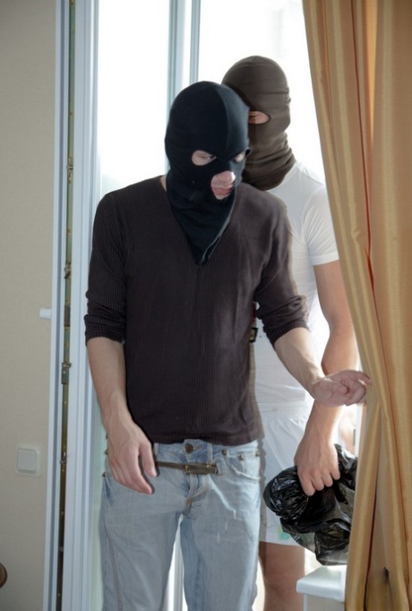Sleeping blonde is fucked by masked home invaders in her socks