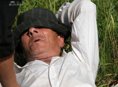 Horny redhead lady finds an old hobo to fuck her horny pussy in a field