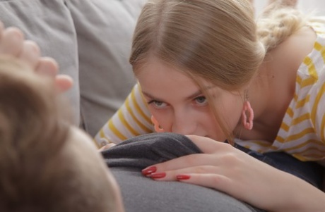 Young blonde Milana Fox takes her partner's dick up her asshole on a couch