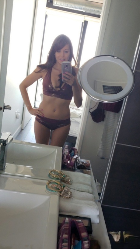 Teen amateur Andi Land takes nude and non-nude self shots