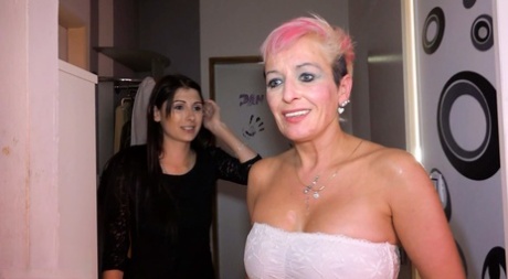Sexy granny Sandra has lesbian sex with a far younger brunette