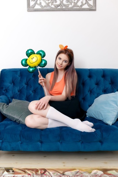 Barely legal teen Margarita exposes her tight ass and slit in white socks