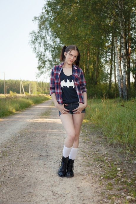 Teen first timer strips totally naked on a dirt road out in the country