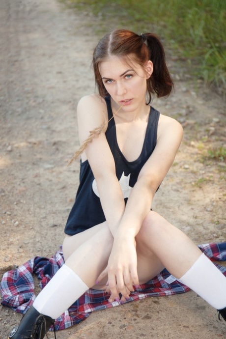 Teen first timer strips totally naked on a dirt road out in the country