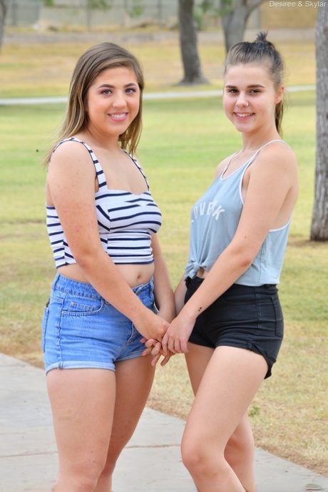 Young amateurs Desiree & Skylar undress before lesbian sex on a rooftop patio