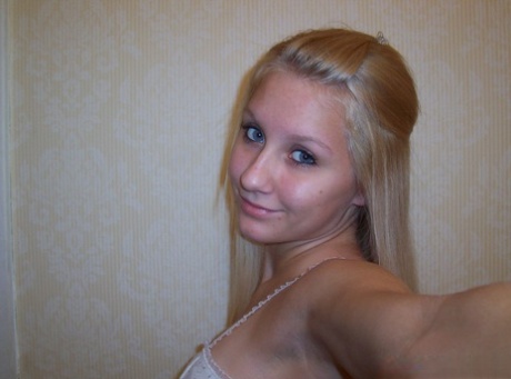 Blonde amateur Kylie takes self shots during safe for work action