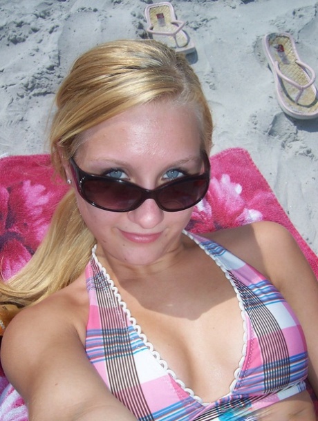 Blonde amateur Kylie takes self shots during safe for work action