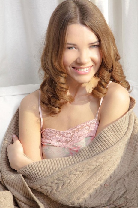 Adorable teen girl Tini pets her tight slit in white socks after panty removal