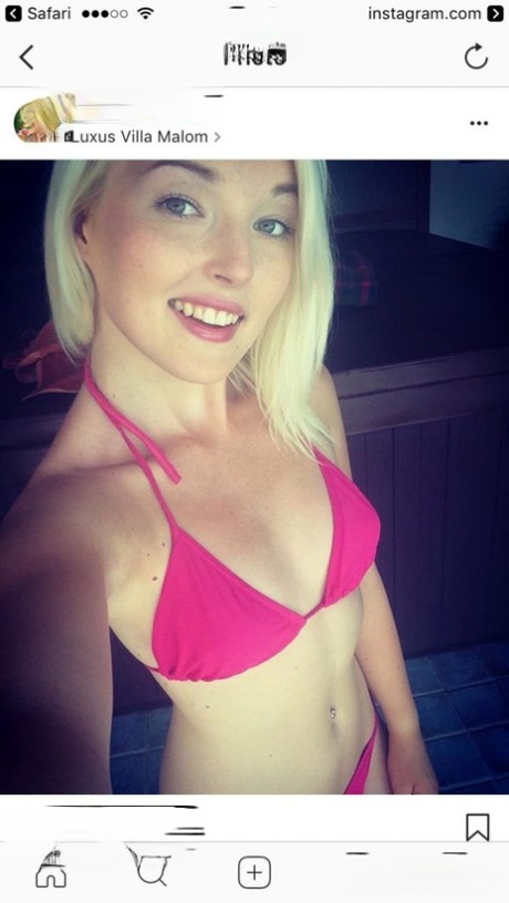 Hot blonde amateur Lovita Fate takes a self shot in hot lingerie & stockings
