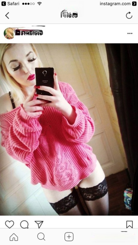 Hot blonde amateur Lovita Fate takes a self shot in hot lingerie & stockings