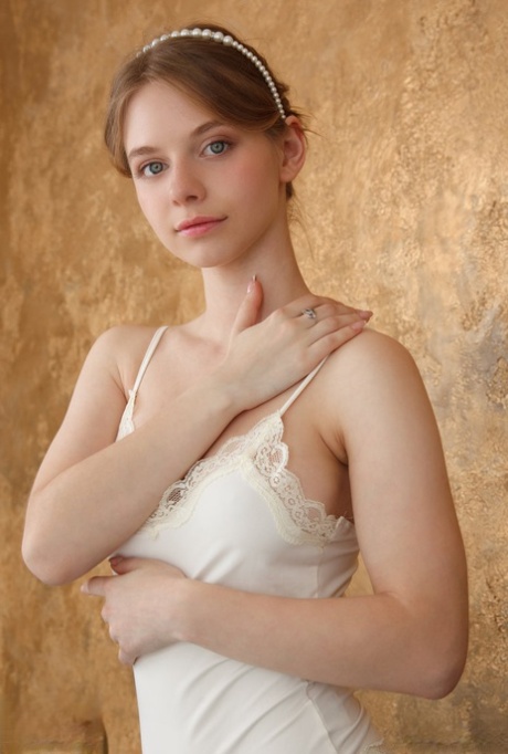 Young beauty Siya uncovers her full breasts before showing her trimmed pussy
