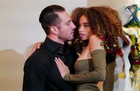 Ebony teen Cecilia Lion sports big permed hair during interracial sex