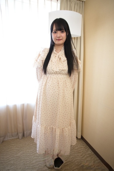 Adorable Japanese teen Reika Kato strips to her bra and panty set