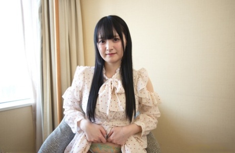 Adorable Japanese teen Reika Kato strips to her bra and panty set
