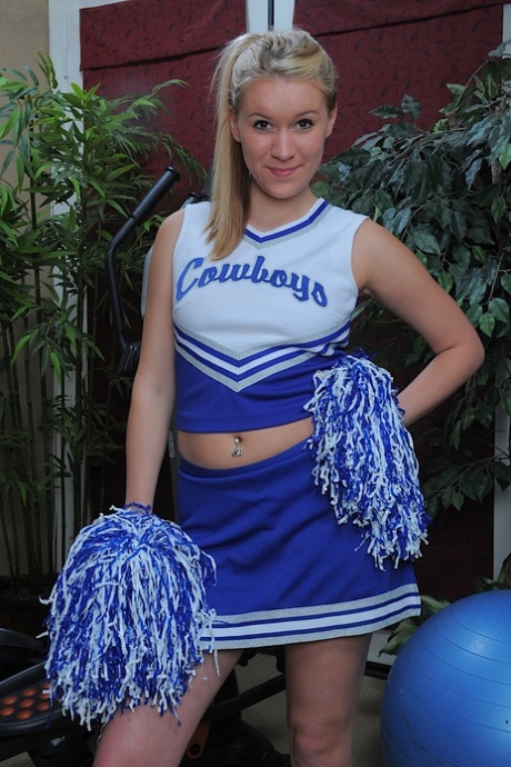Amateur cheerleader Kristy Kay bares cameltoe and spreads pussy for close up