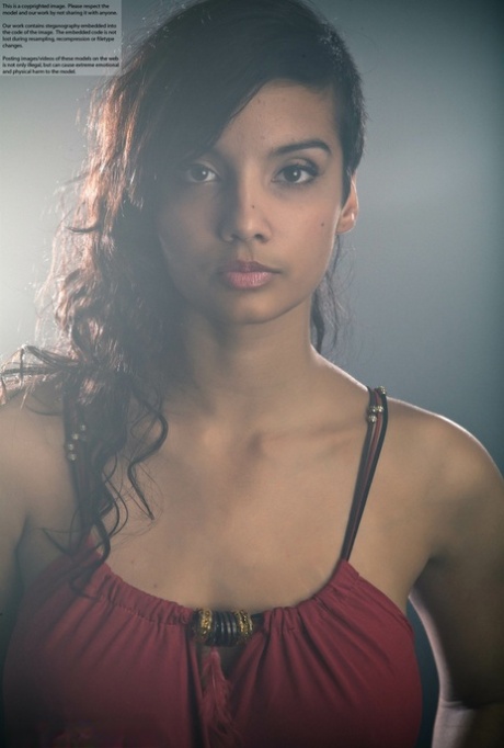 Beautiful Desi female removes her dress to expose her big natural boobs
