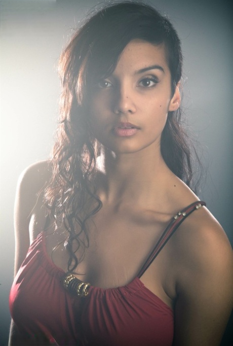 Beautiful Desi female removes her dress to expose her big natural boobs
