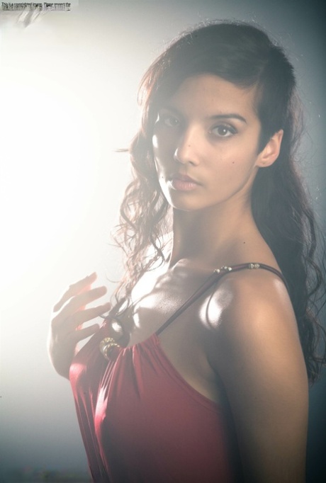 Beautiful Desi female removes her dress to expose her big natural boobs