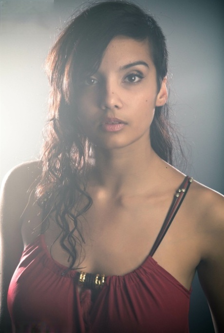 Beautiful Desi female removes her dress to expose her big natural boobs