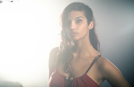 Beautiful Desi female removes her dress to expose her big natural boobs