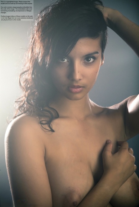 Beautiful Desi female removes her dress to expose her big natural boobs