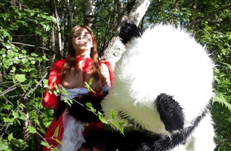 Pretty teen with big tits has a hardcore sex with panda toy outdoor