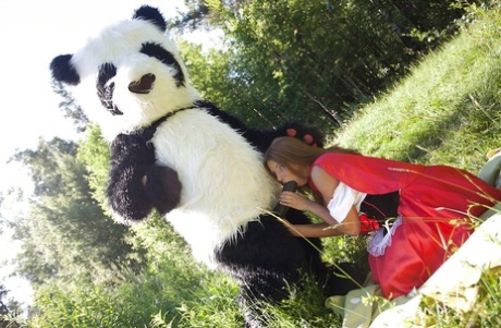 Pretty teen with big tits has a hardcore sex with panda toy outdoor