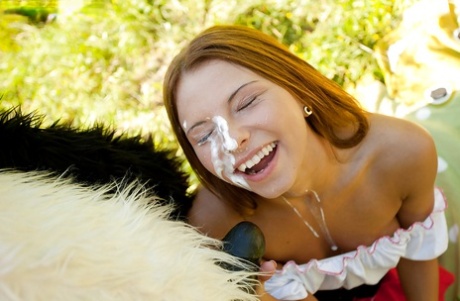 Pretty teen with big tits has a hardcore sex with panda toy outdoor