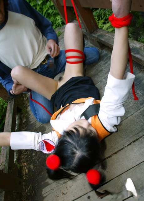Submissive asian babe gets bound and roughly fucked outdoor