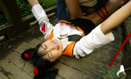 Submissive asian babe gets bound and roughly fucked outdoor