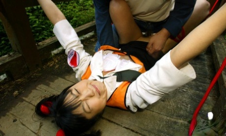 Submissive asian babe gets bound and roughly fucked outdoor