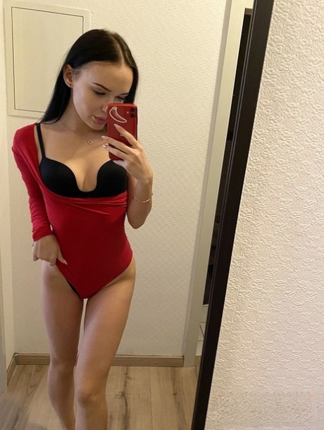 Black haired beauty Sasha Sparrow slowly unveils her tiny tits and tasty cunt