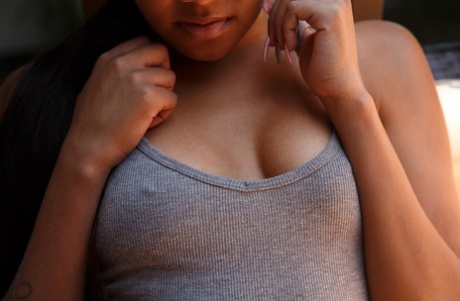Ebony teen with a big bum Dajah Wallace poses and teases with her curves