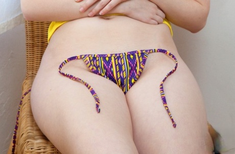 Sexy amateur teen Miranda Painter posing in her sexy panties & yellow shirt