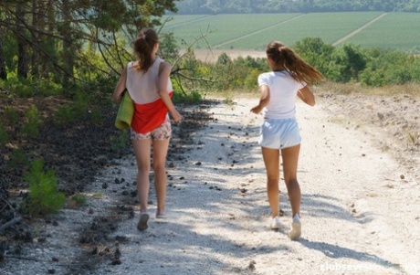 Hot lesbian teens Kecy Hill & Shine giving each other a licking outdoors