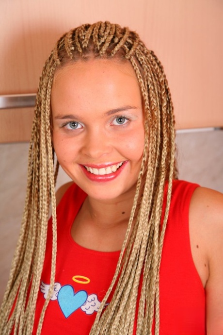 Teen with dreads Jewel toys with an eggplant after stripping in the kitchen